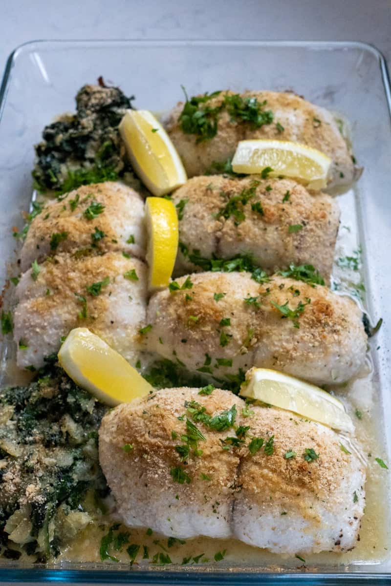 This Baked Flounder Florentine is made with flounder, olive oil, onion, spinach, bread crumbs, white wine and parsley.