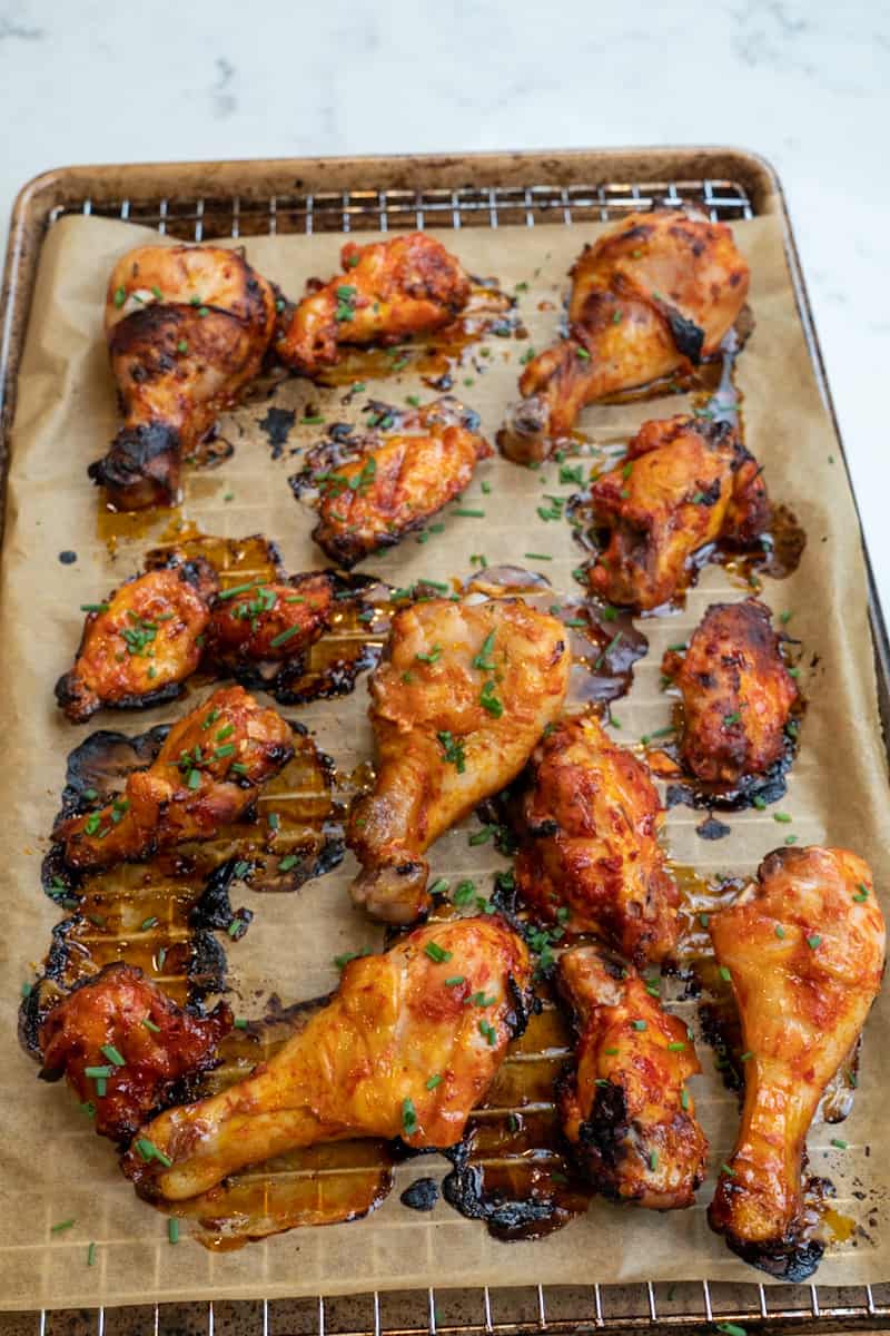 This Harissa Honey Chicken Recipe (Air Fryer or Oven) is made with bone in chicken, harissa paste, honey, garlic, ginger and is baked.