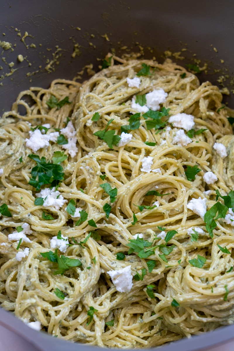 Garnish with feta cheese and cilantro. Enjoy this Mexican Green Spaghetti with Poblano Sauce.