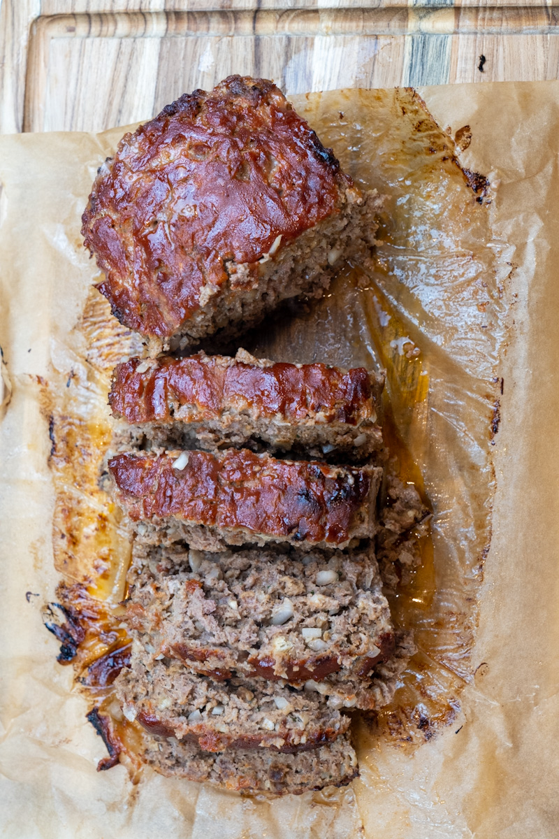 This Meatloaf with Stuffing is made with Stove Top stuffing, ground beef, onion, garlic, eggs, and served with a perfect glaze.