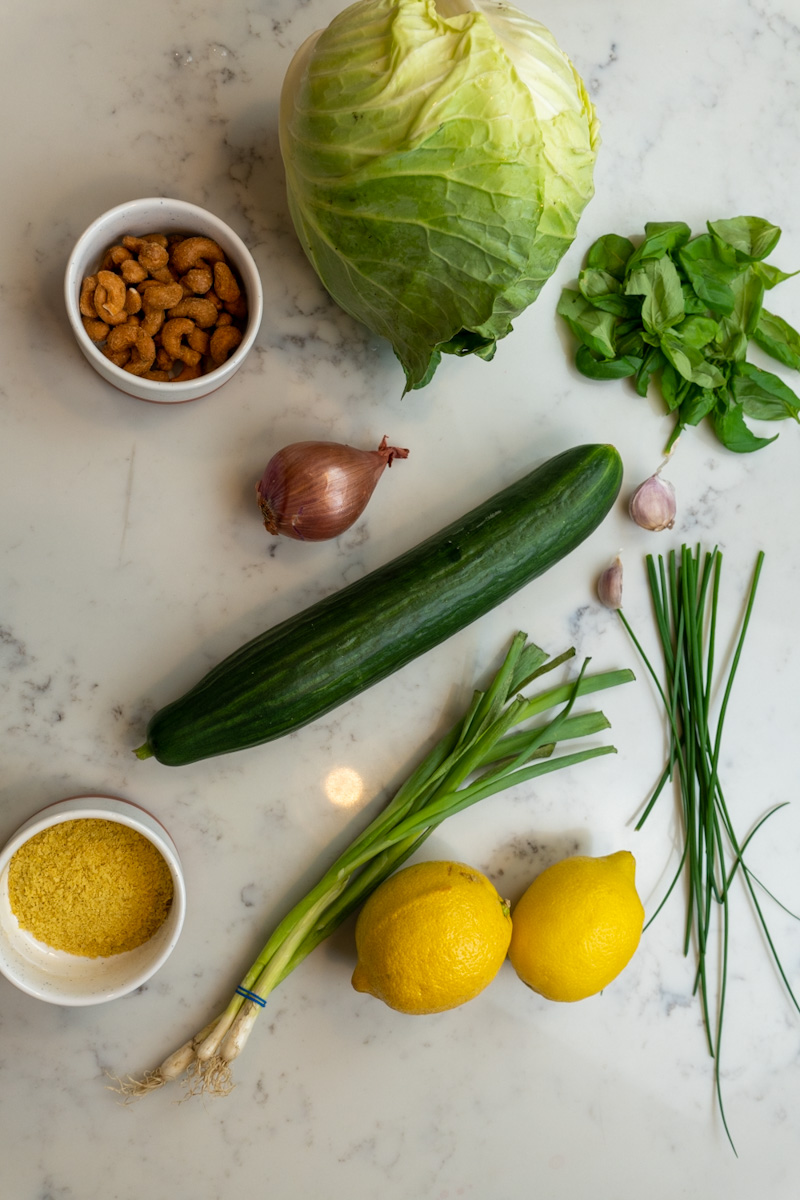 This TikTok Green Goddess Salad Recipe is made with iceberg lettuce, cucumbers, chives, scallions, and tossed in a homemade green goddess dressing.