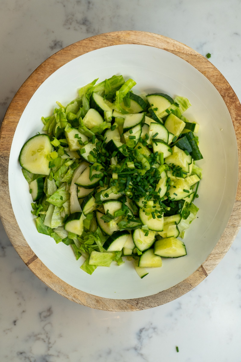 This TikTok Green Goddess Salad Recipe is made with lettuce, cucumbers, chives, scallions, and tossed in a homemade green goddess dressing.