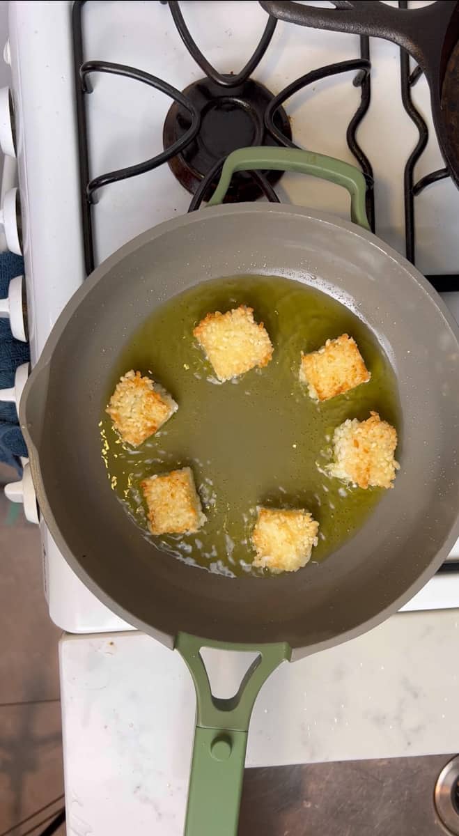 In a fry pan with avocado oil, fry for about 2 minutes per side or until golden brown and add to a drying rack over a baking sheet to cool while you make the salmon.