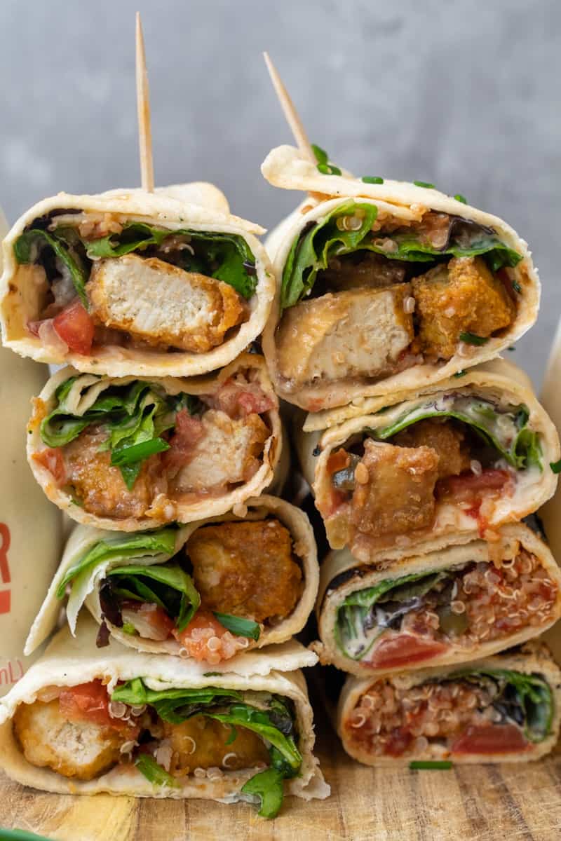 These Vegan Tofu Wraps are made with store bought vegan Caesar dressing, flour tortillas, baked tofu, and topped with lettuce and pico de gallo.