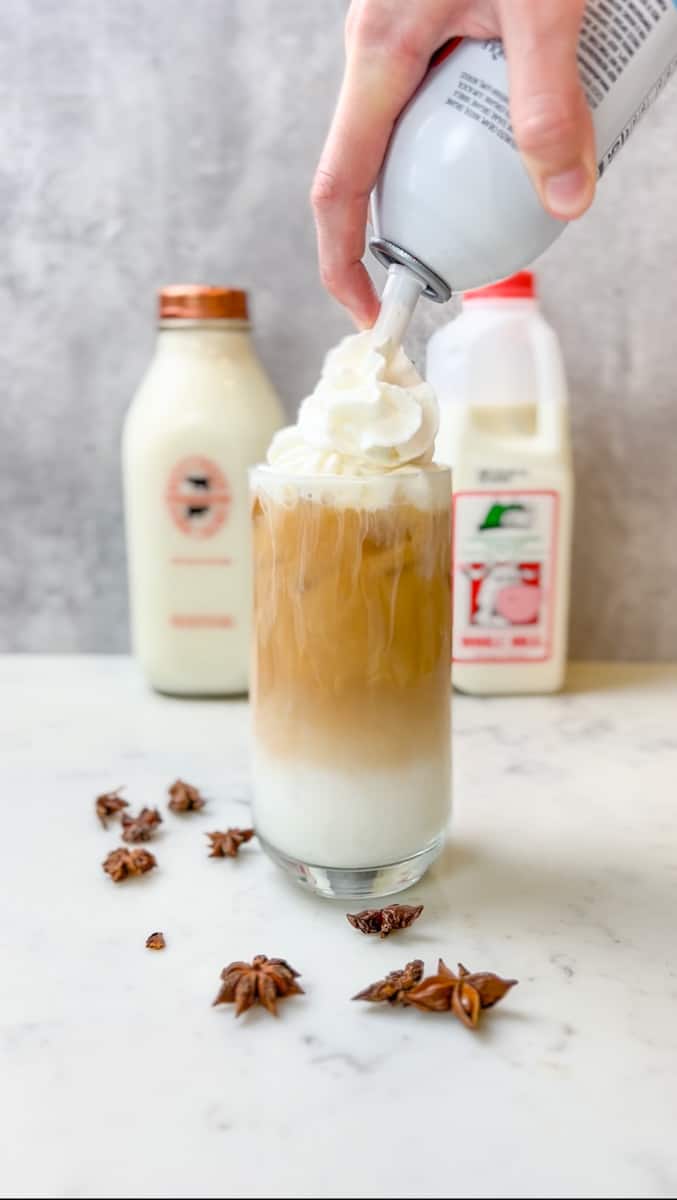 Fill a big glass with ice. Add milk. into the Iced Chai Latte Starbucks Recipe.