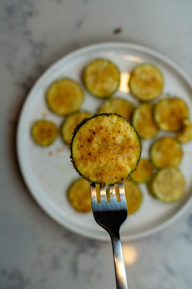 These Air Fryer Zucchini Slices take 20 minutes to make, and you'll have the perfect snack or side for your summertime meals!