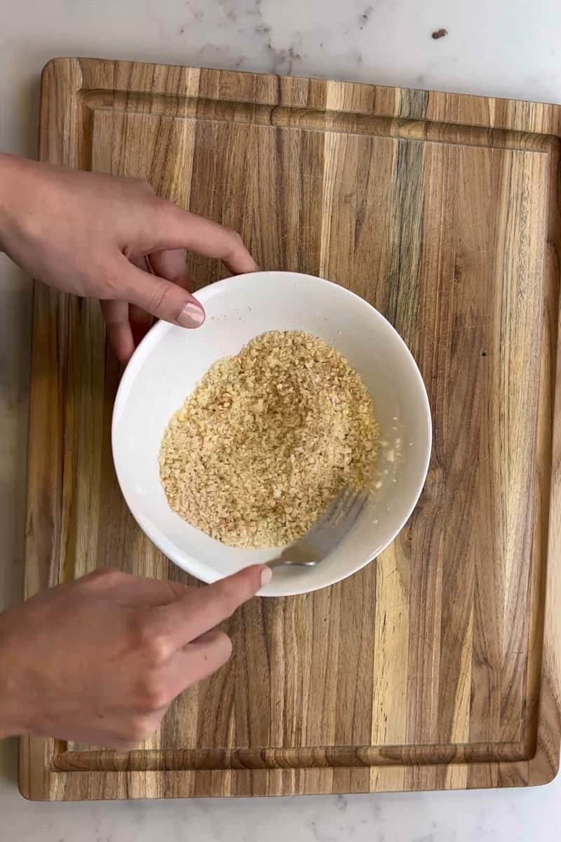 In a small bowl, add the panko crumbs, old bay, parmesan and mix.