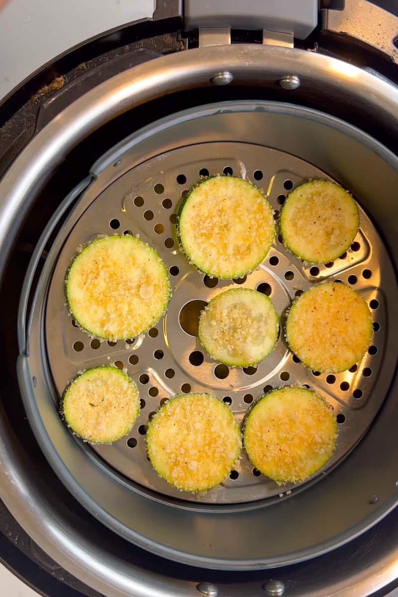Add the zucchini in an even layer in the air fryer basket. Cook at 400 degrees for a total of 10 minutes, flipping once halfway.