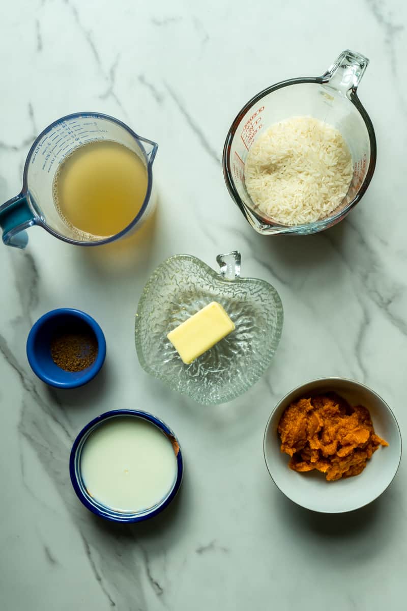 This Canned Pumpkin Rice Recipe with Coconut Milk is made with butter, rice, pumpkin puree, coconut milk, and simmered to perfection. 