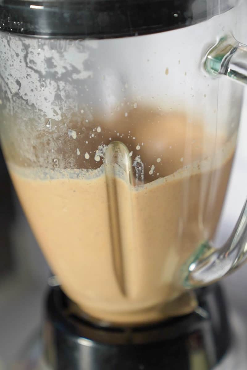 Make a strong shot of espresso and add to the blender and blend for 10 seconds until light and frothy. 