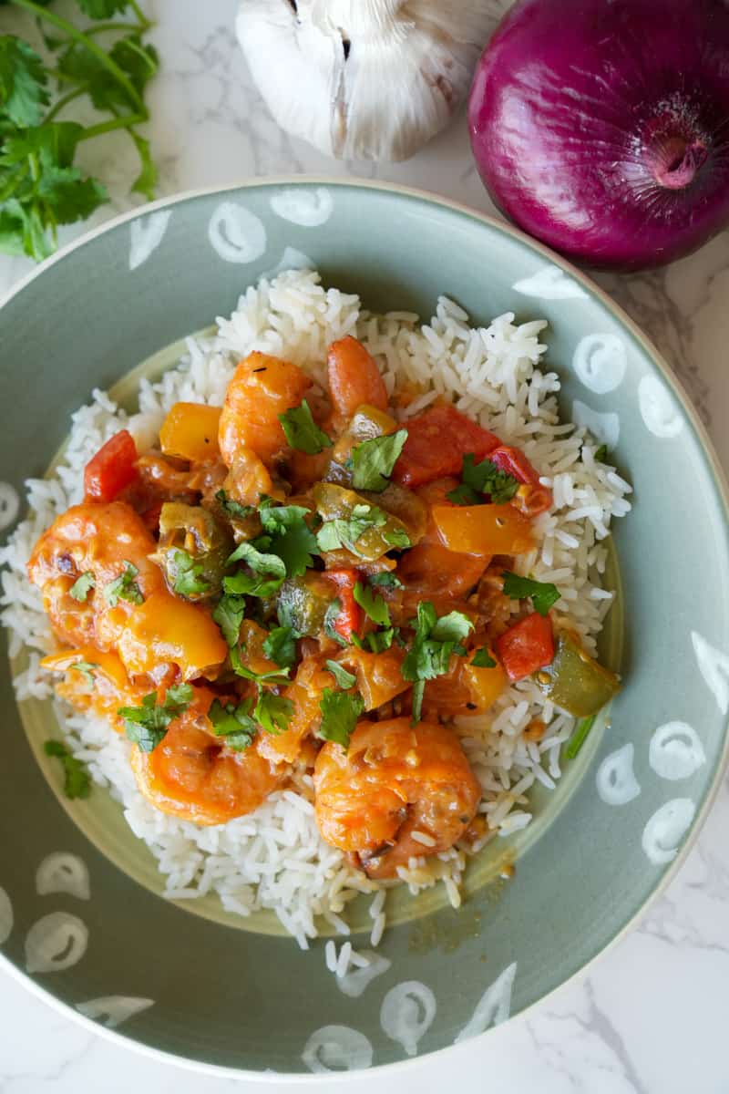 This Creamy Shrimp in Coconut Sauce is an Ecuadorian dish that contains achiote, coconut milk and infuses the shrimp shells in the sauce. 