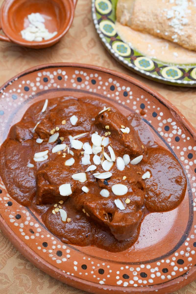 This Almond Mole Recipe is an authentic recipe from my family in Mexico City, and made with many ingredients, like almonds. 
