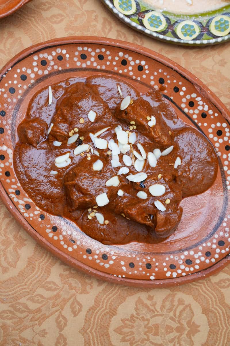 Stir and simmer for 45 minutes on low heat, covered, until the chocolate has melted and the pork is completely cooked through. (You should use cooked pork).