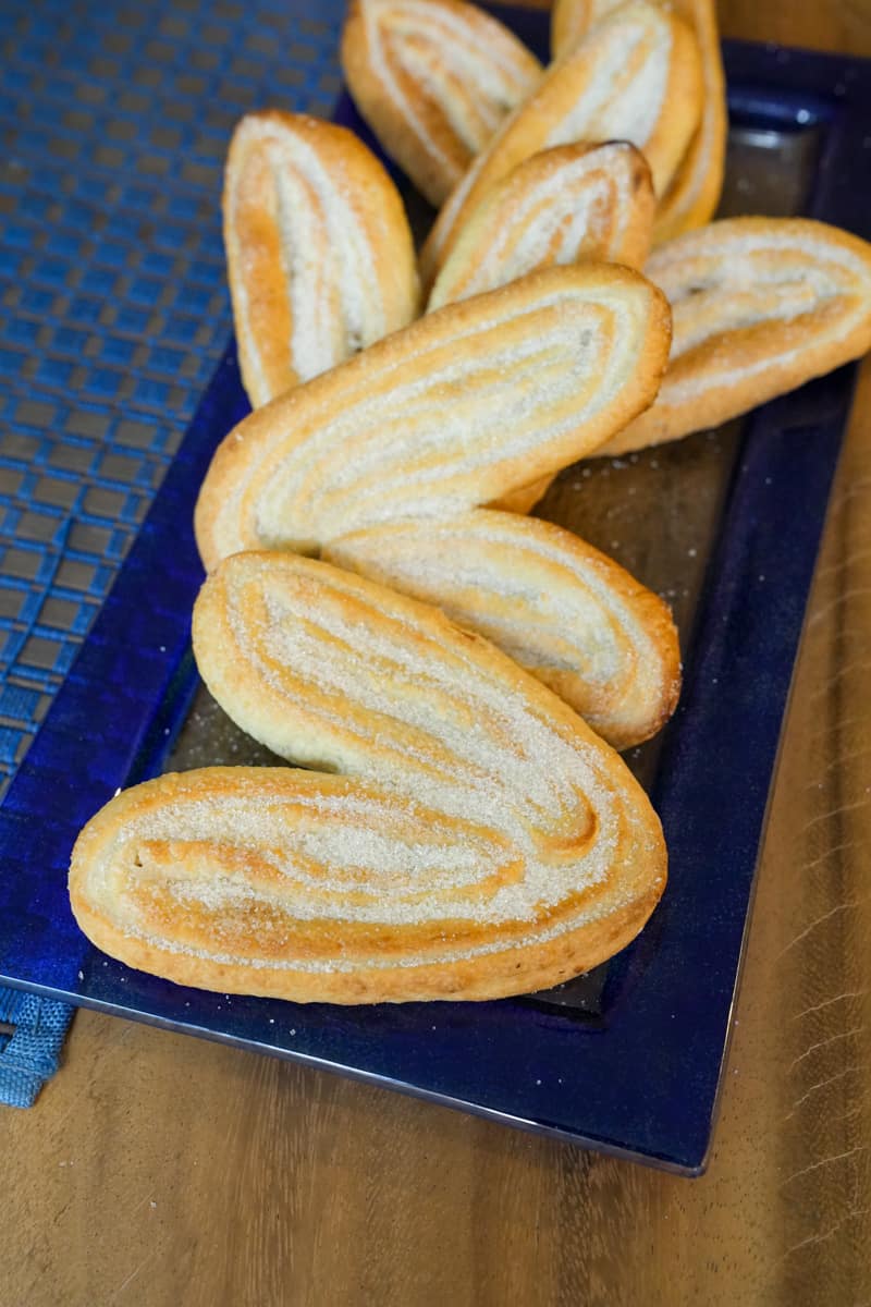 Bake in the preheated oven for about 10-12 minutes or until the orejas are golden brown and crispy. Remove from the oven while they are hot, toss in some more sugar to coat. Enjoy this Orejas Mexican Pan Dulce Recipe (Palmiers).