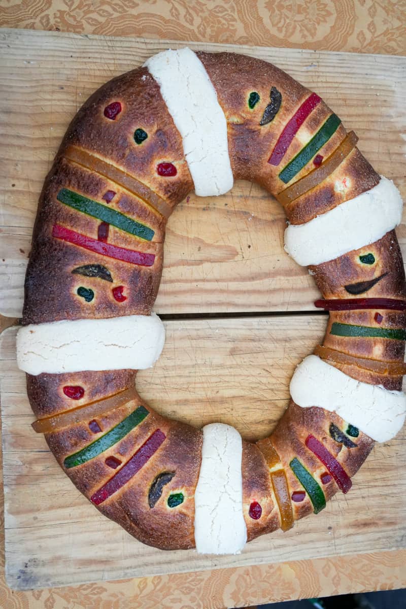 Rosca de Reyes is a bun made with a sweet dough in the shape of a wreath decorated with slices of candied fruit of various colors. 