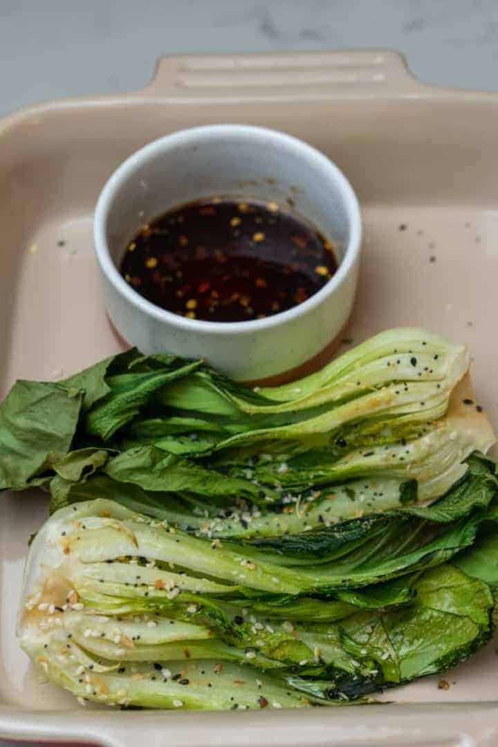 This Air Fried Bok Choy Recipe is made with sesame oil, soy sauce, garlic powder, air fried and served with a delicious honey soy sauce.