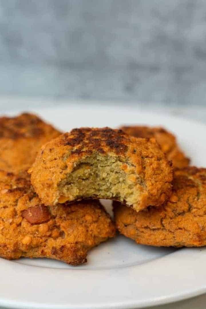 This Lentil Patties Recipe are made with red lentils, garlic, red onion, carrots, panko crumbs, tomato paste and baked or pan fried.
