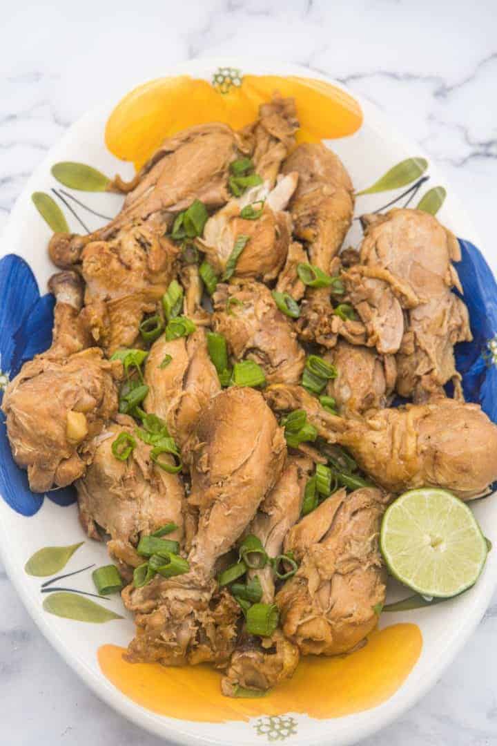 This Chicken Adobo Recipe is made with chicken drumsticks, soy sauce, vinegar, garlic, bay leaves and simmered into perfection.