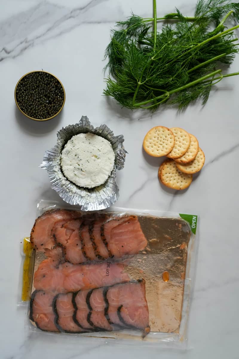This Smoked Salmon Canapés Recipe with Caviar uses delicate smoked salmon, creamy cheese and caviar on a crisp cracker.