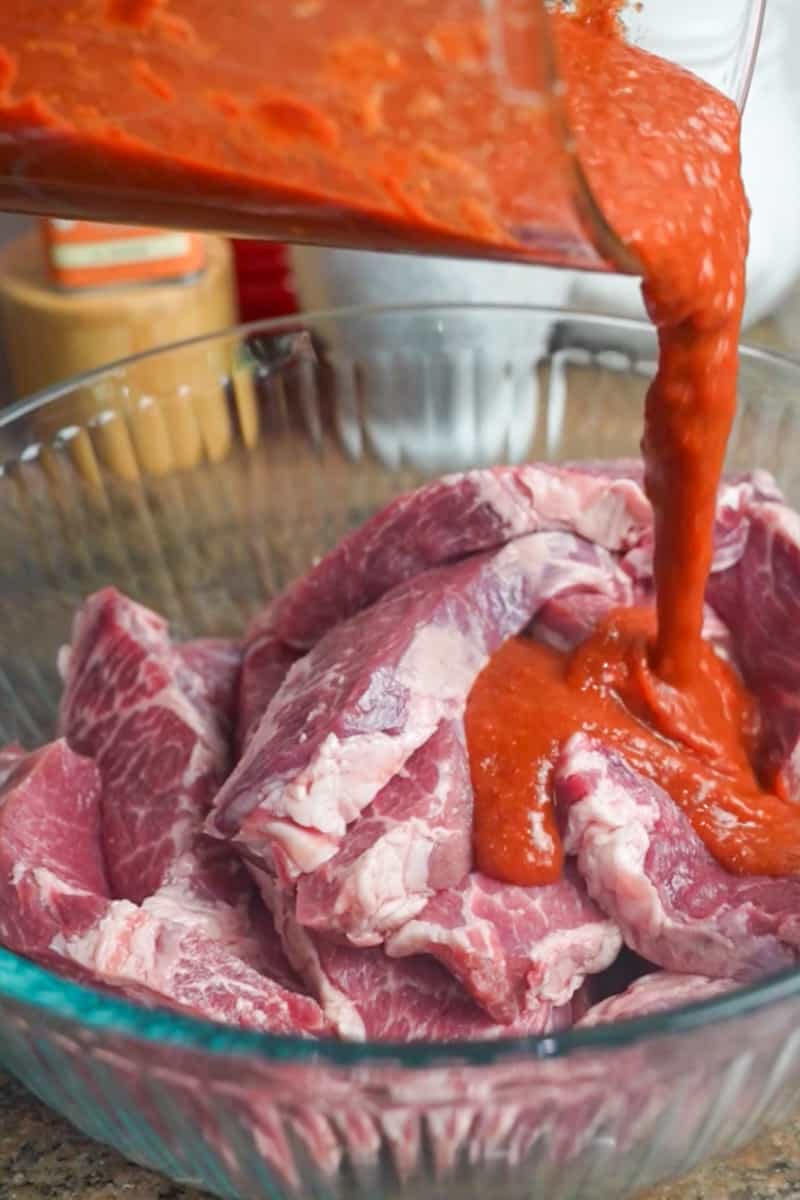 Pour the marinade over the pork and make sure all pieces are well coated. Seal the bag or cover the bowl and refrigerate for at least 2 hours, preferably overnight, to let the flavors develop. Take the pork out and bring to room temperature. 