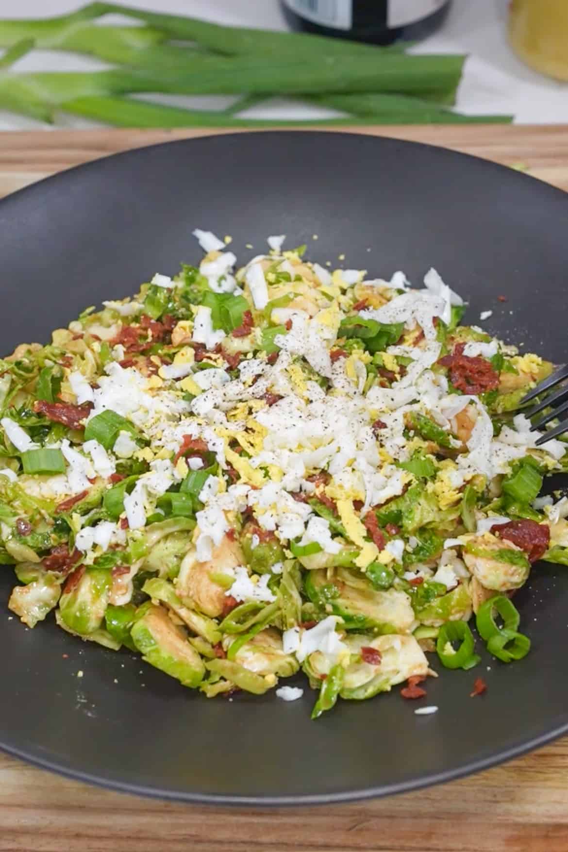 This Brussels Sprouts Salad Recipe has cooked chorizo, a satisfying crunch, mingling with the earthy goodness of shredded Brussels sprouts. 