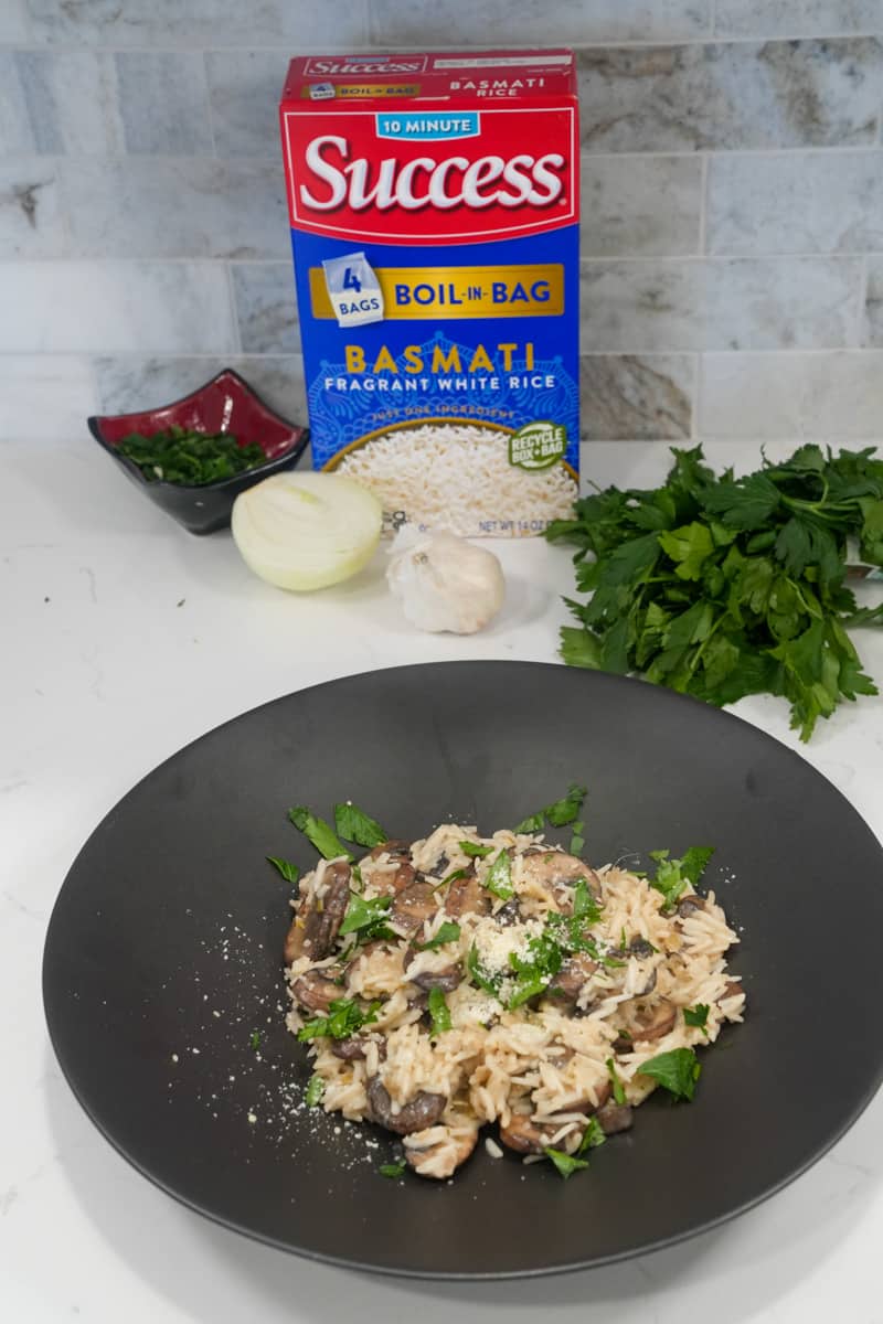 Indulge in creamy Mushroom Risotto simmered in white wine and broth, meld with cream cheese, cream, and Parmesan for a decadent flavor. 