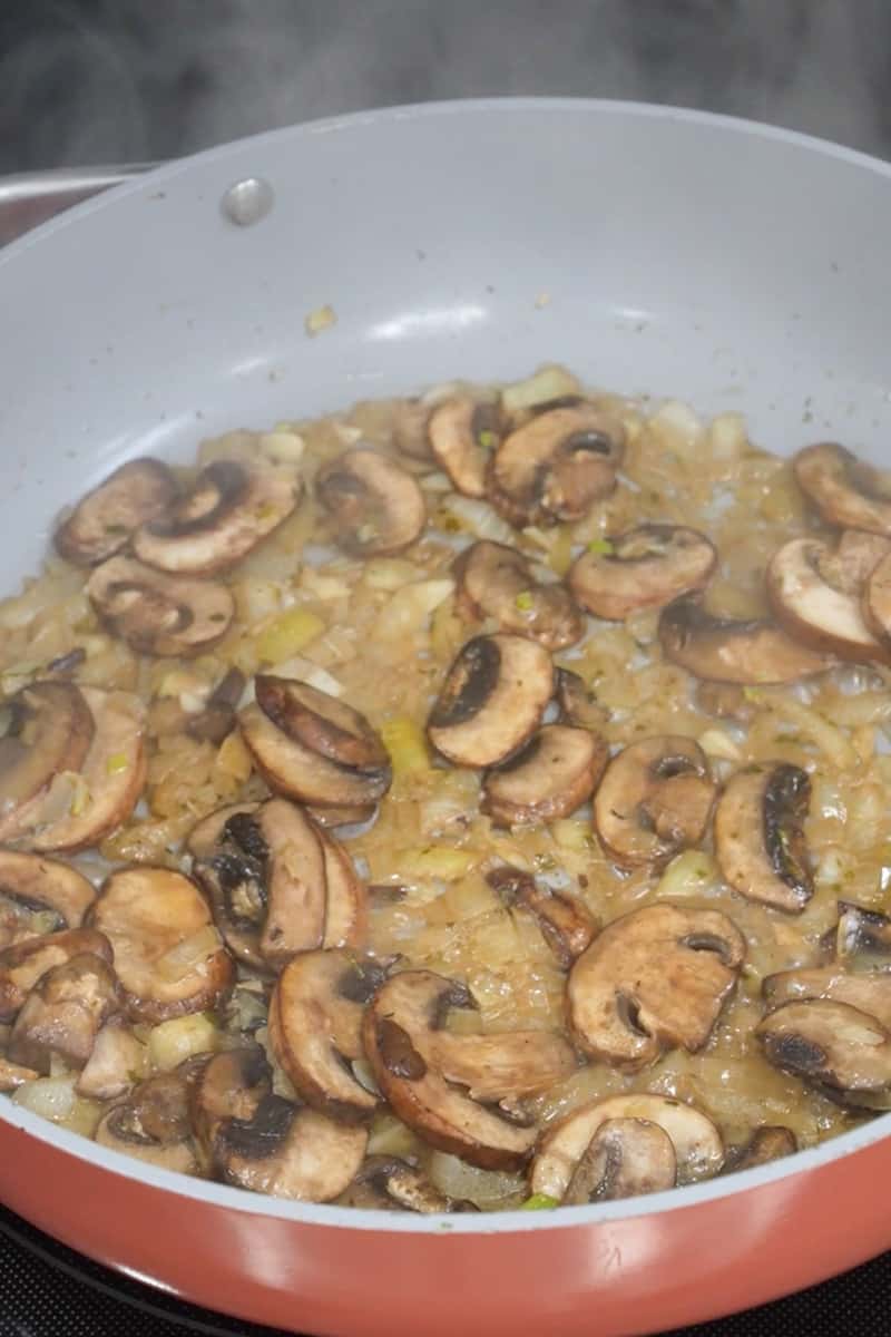 Prepare the Success Boil-in-Bag Basmati Rice according to package instructions. In a large skillet or pan, melt the butter over medium heat. Add the chopped onion and sauté until translucent, about 2-3 minutes. Add sliced mushrooms to the skillet. Cook until the mushrooms are tender and lightly browned, about 5-7 minutes. Add garlic and cook until fragrant.